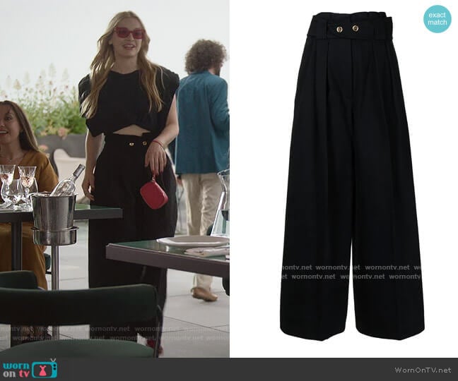 High-waist belted trousers by Patou worn by Camille (Camille Razat) on Emily in Paris