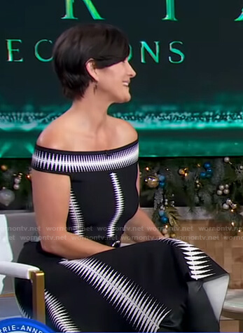 Carrie-Anne Moss’s black stripe off-shoulder dress on Good Morning America