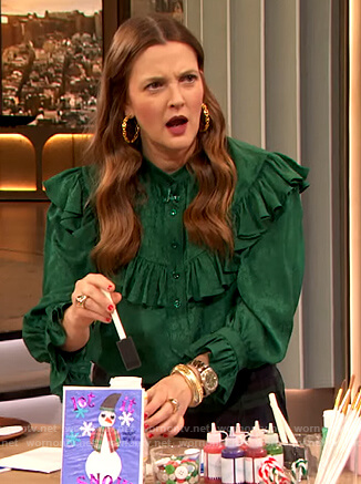 Drew's green ruffled blouse and plaid pants on The Drew Barrymore Show