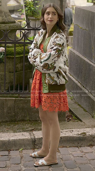 Emily's orange lace dress and horse print bomber jacket on Emily in Paris