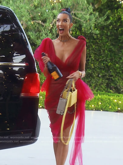Noella’s red ruffled dress and bag on The Real Housewives of Orange County