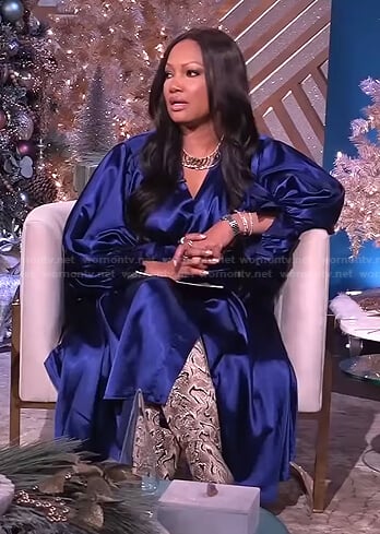 Garcelle's blue satin wrap dress on The Real