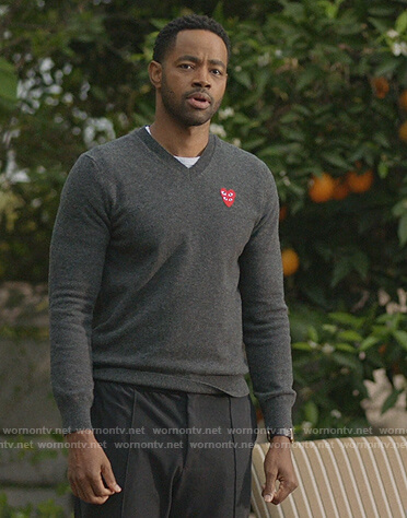 Lawrence's gray heart sweater on Insecure