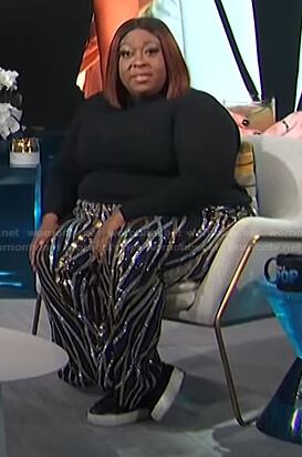 Loni’s sequin striped pants on E! News Daily Pop