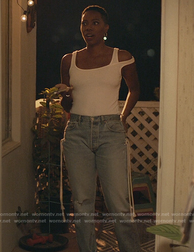 Molly’s white asymmetric shoulder top on Insecure