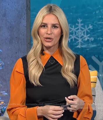 Morgan's orange shirt and Prada black dress on E! News Daily Pop