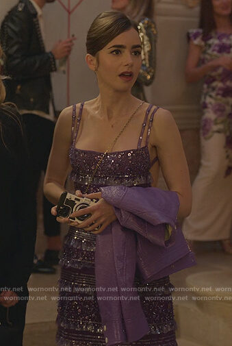 Emily’s purple leather jacket and dress on Emily in Paris