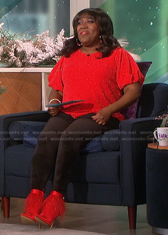 Sheryl’s red metallic puff sleeve top and feather boots on The Talk