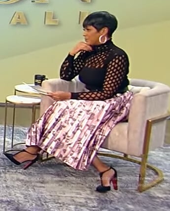 Tamron's black mesh top and floral skirt on Tamron Hall Show