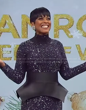 Tamron's glitter knit sweater and corset belt on Tamron Hall Show