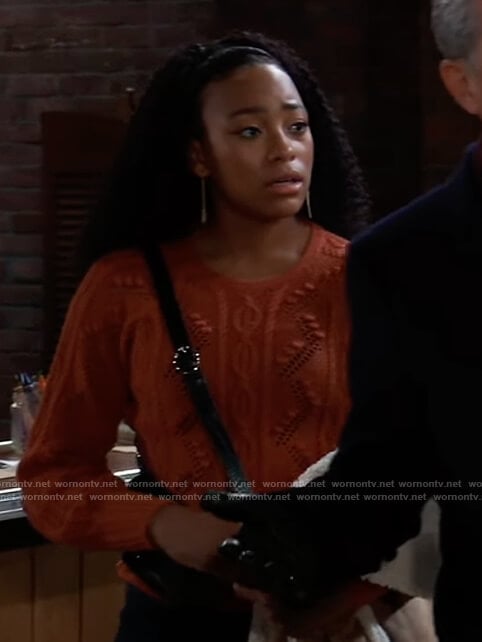 Trina's orange cable knit sweater on General Hospital