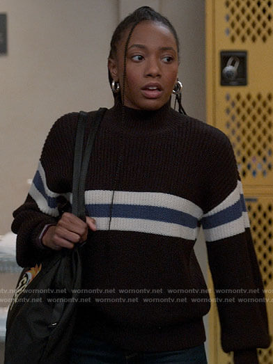 Whitney’s black sweater with blue and white stripe on The Sex Lives of College Girls