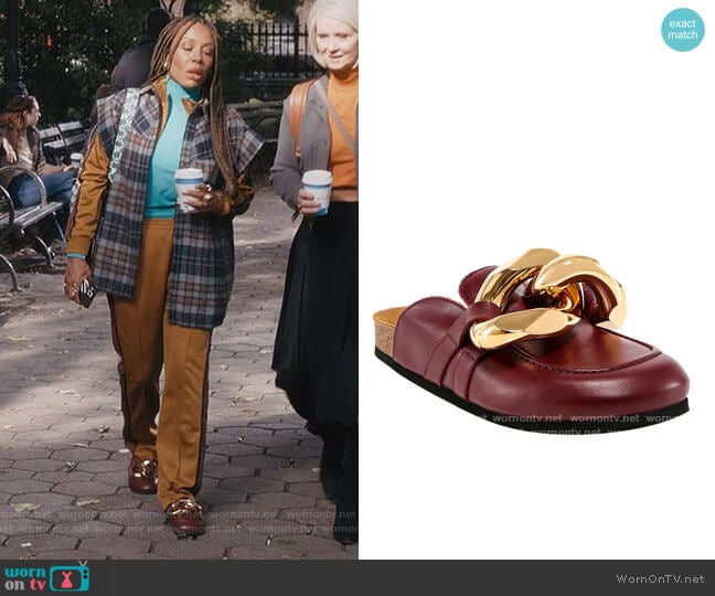 Chain backless leather loafers by JW Anderson worn by Dr. Nya Wallace (Karen Pittman) on And Just Like That