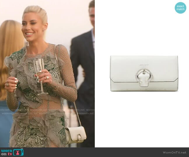 Wallet crystal-buckle clutch bag by Jimmy Choo worn by Heather Rae Young on Selling Sunset