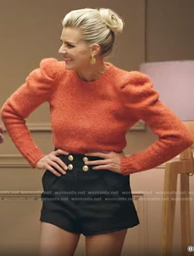 Amy's orange puff sleeve sweater and button detail shorts on Pivoting