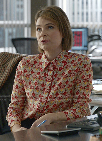Taylor’s red printed blouse on Bull