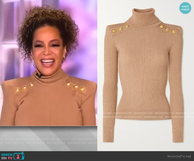 Button-embellished ribbed-knit turtleneck sweater by Balmain worn by Sunny Hostin on The View