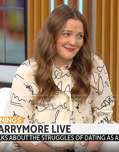 Drew Barrymore’s cream scribble print blouse and skirt set on CBS Mornings