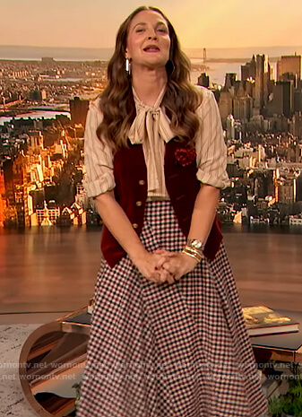 Drew’s striped blouse and check skirt on The Drew Barrymore Show