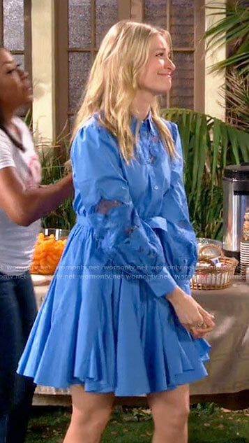 Gemma’s blue cotton flared dress on The Neighborhood