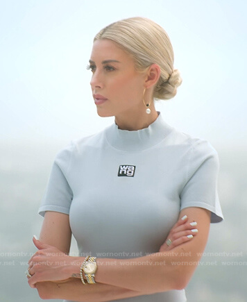 Heather’s blue logo patch short sleeve dress on Selling Sunset