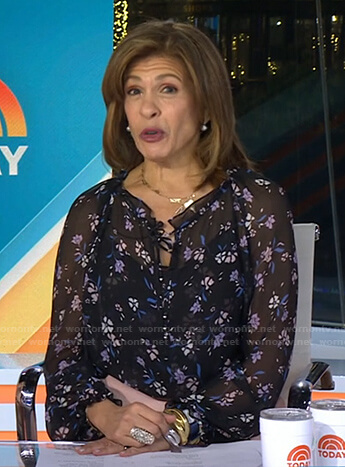 Hoda’s black floral top and pink belted pants on Today