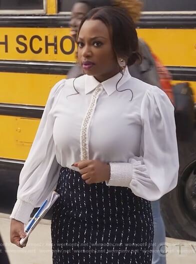 Jill’s white embellished top and skirt on Queens