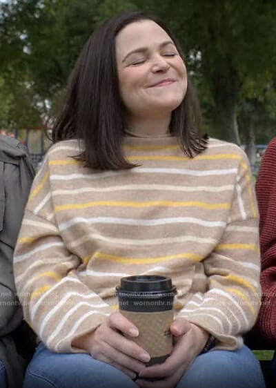 Jodie's beige and yellow striped sweater on Pivoting