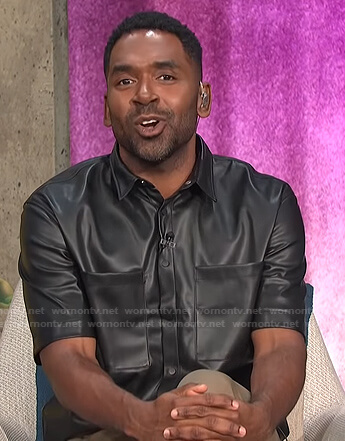 Justin's black short sleeve leather shirt on E! News Daily Pop
