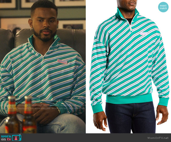 Striped Quarter Zip Sweatshirt by Lacoste worn by Aaron Jackson (Trevor Jackson) on Grown-ish