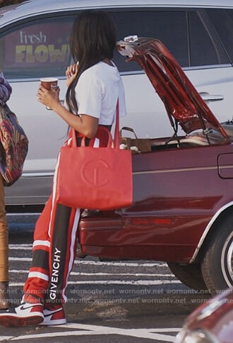 Lauren’s red Givenchy logo pants on Queens