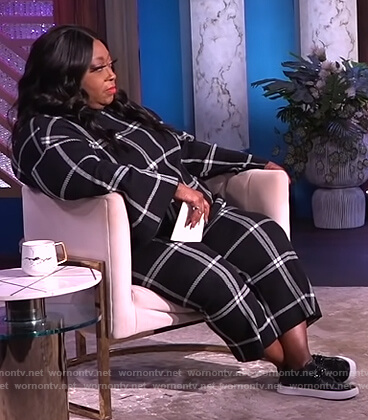 Loni’s black check sweater and pants on The Real