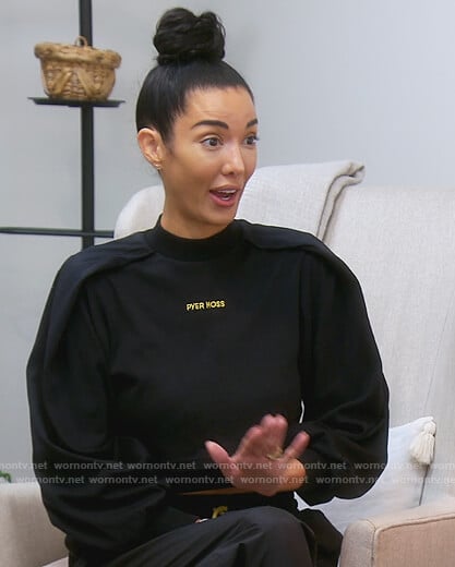 Noella’s black puff sleeve sweater on The Real Housewives of Orange County