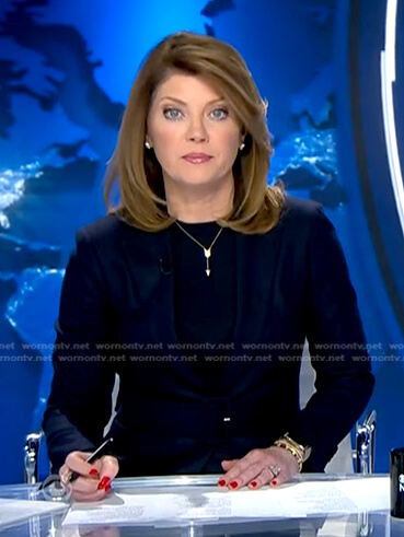 Norah's navy belted blazer on CBS Evening News