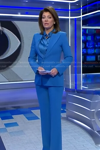 Norah's blue satin shirt and peak lapel blazer on CBS Evening News
