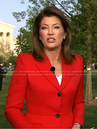 Norah's red peplum blazer on CBS Evening News