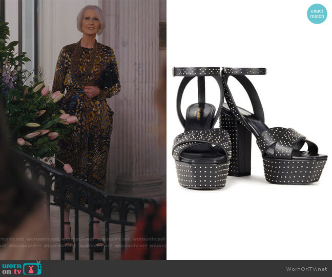 Studded leather platform sandals by Saint Laurent worn by Miranda Hobbs (Cynthia Nixon) on And Just Like That