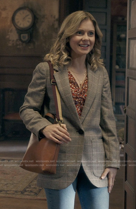 Sam’s grey checked blazer and floral top on Ghosts