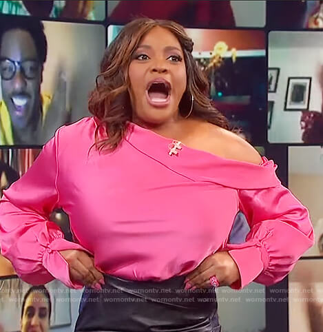 Wendy Williams looks glam with bright pink Gucci shirt and