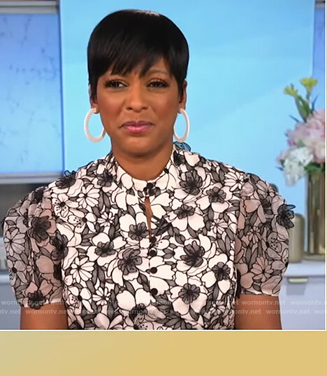 Tamron’s black and white floral lace dress on Tamron Hall Show