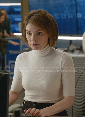 Taylor’s white short sleeve turtleneck sweater on Bull