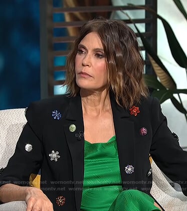 Teri Hatcher’s green dress and black embellished blazer on E! News Daily Pop