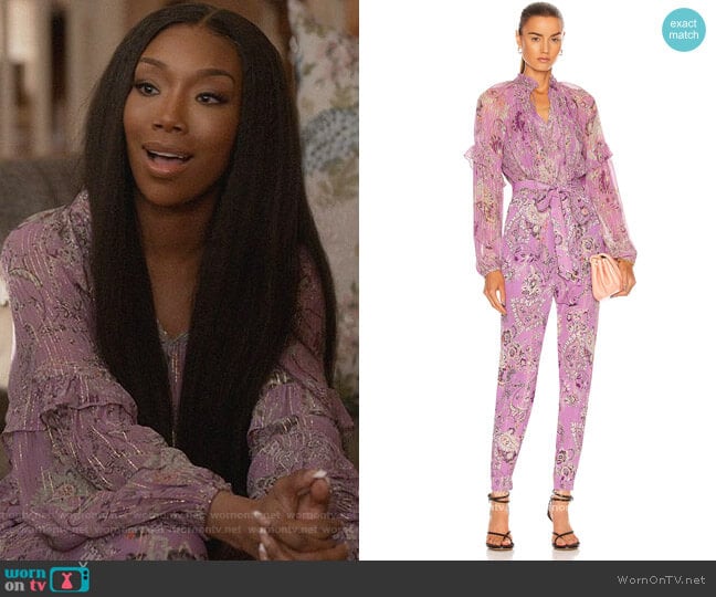 Naomi’s lavender metallic jumpsuit on Queens