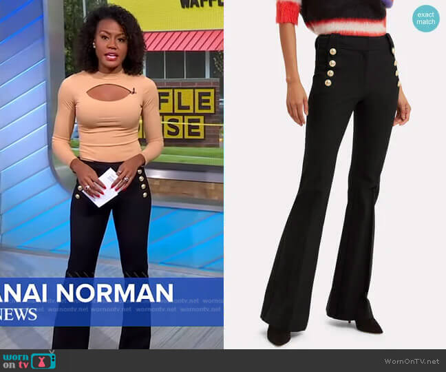 WornOnTV: Janai’s cutout top and black pants with gold buttons on Good ...