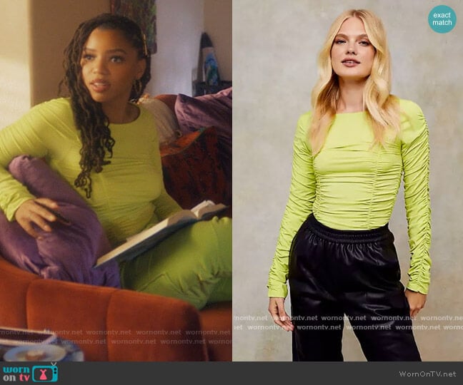 Topshop long sleeve ruched top in yellow in ASOS worn by Jazlyn Forster (Chloe Bailey) on Grown-ish