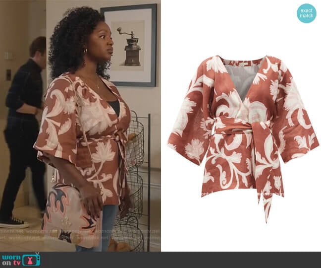 Carina floral-print linen wrap top by Cala de la Cruz worn by Bridgette Pierce (Yaani King Mondschein) on The Kings of Napa