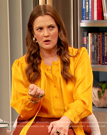 Drew’s yellow jacquard tie neck blouse on The Drew Barrymore Show