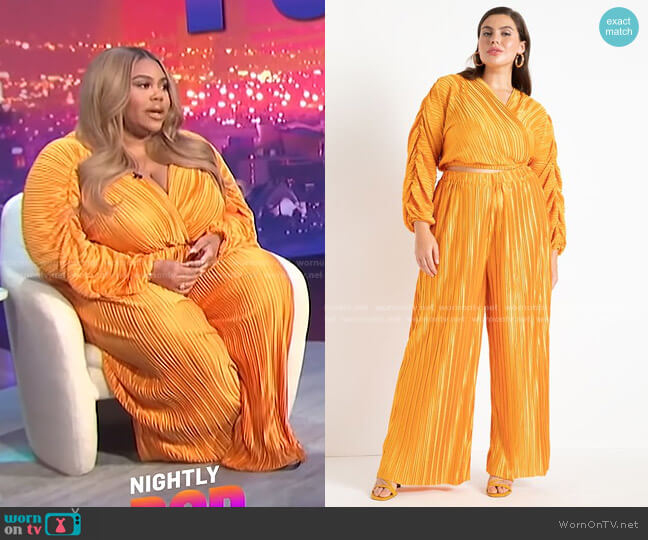 WornOnTV: Nina’s orange pleated wrap top and pants on E! News Nightly ...