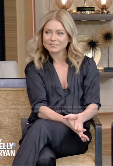 Kelly’s black satin jumpsuit on Live with Kelly and Ryan