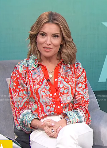 Kit’s red floral blouse on Access Hollywood